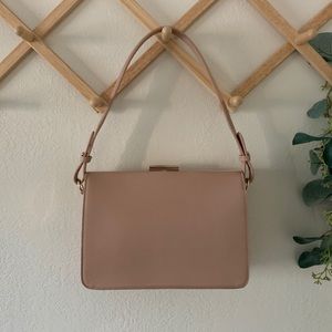 Blush colored purse